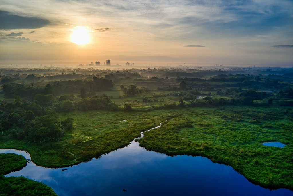 aerial photography of landscape with view of sunset