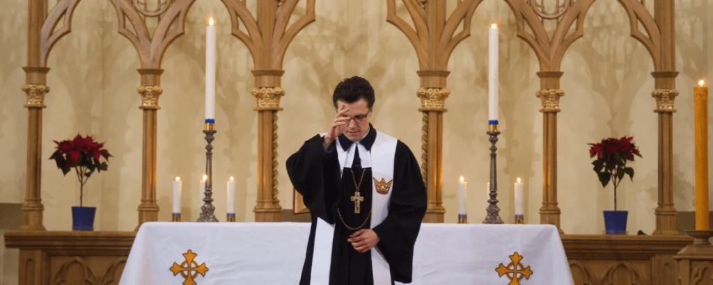 Znak križa - luteranski svećenik